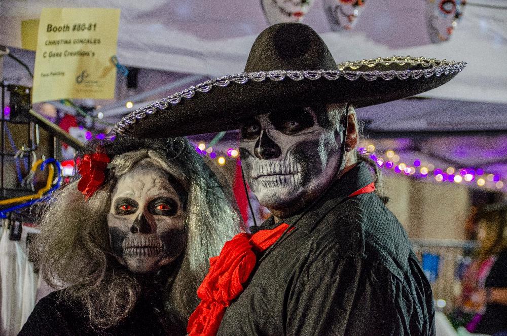 picture of a couple dressed up at dia de los muertos festival in corpus christi, texas