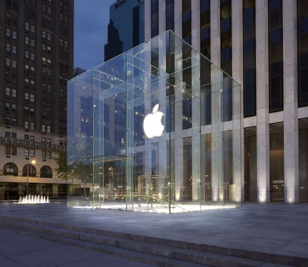 the-store-on-new-yorks-fifth-avenue-consists-of-a-32-foot-glass-cube-thats-entirely-self-supporting-a-glass-staircase-leads-into-the-store-below