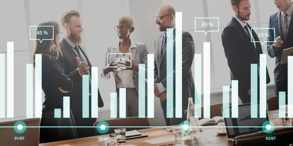 group of digital marketing sales professionals in the background meeting, vector graphics of bar charts in the foreground representing leads from a digital advertising company 